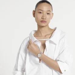 DAMES Gucci Horloges^29 mm roestvrijstalen kast, roségoud vergulde lunet, zilveren wijzerplaat, roestvrijstalen armband, quartz uurwerk