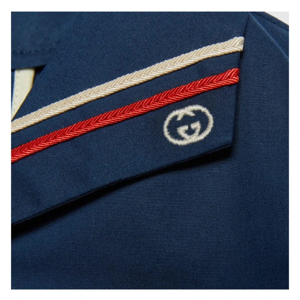 Gucci Bodysuits & Sets^Blauwe Kinderjurk met G-logo Borduursel