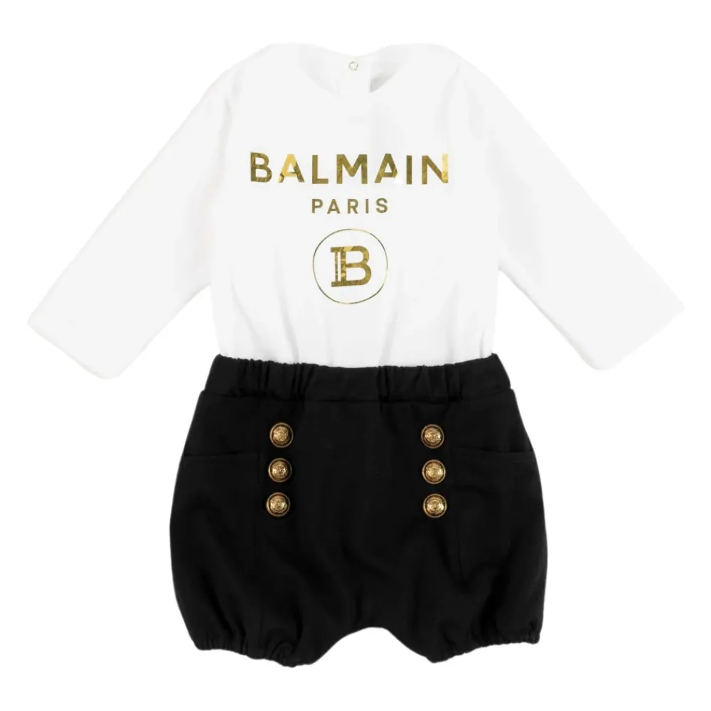 Balmain Elegante Stro Jumpsuit met Lange Mouwen en Geribbelde Manchetten