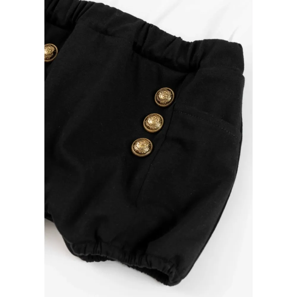 Balmain Elegante Stro Jumpsuit met Lange Mouwen en Geribbelde Manchetten