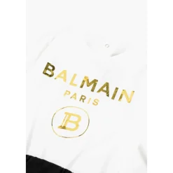 Balmain Elegante Stro Jumpsuit met Lange Mouwen en Geribbelde Manchetten