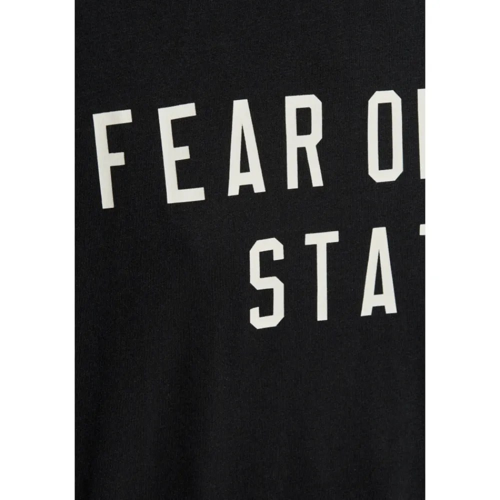 DAMES Fear Of God T-shirt met bedrukt logo